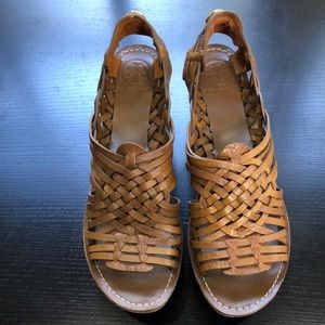 Never worn!!  Tory Burch cork wedges.  Leather braided uppers.  Size 9 1/2 M.